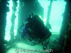 Clayton Bonnell exploring the Ancient Mariner off Fort La... by Michael Kovach 
